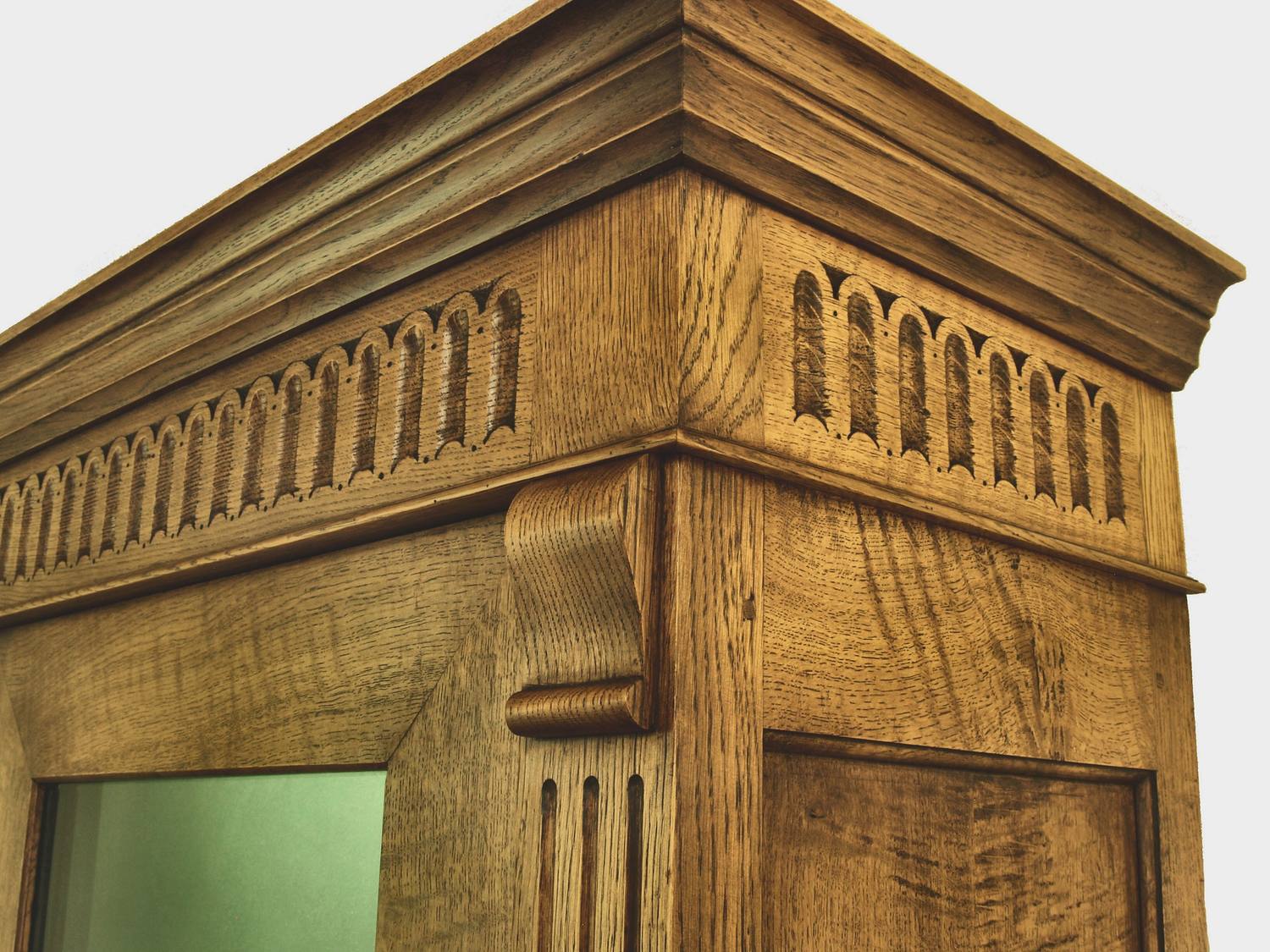 Cornice detail on a bespoke cabinet — one of the details covered in our gun storage guides