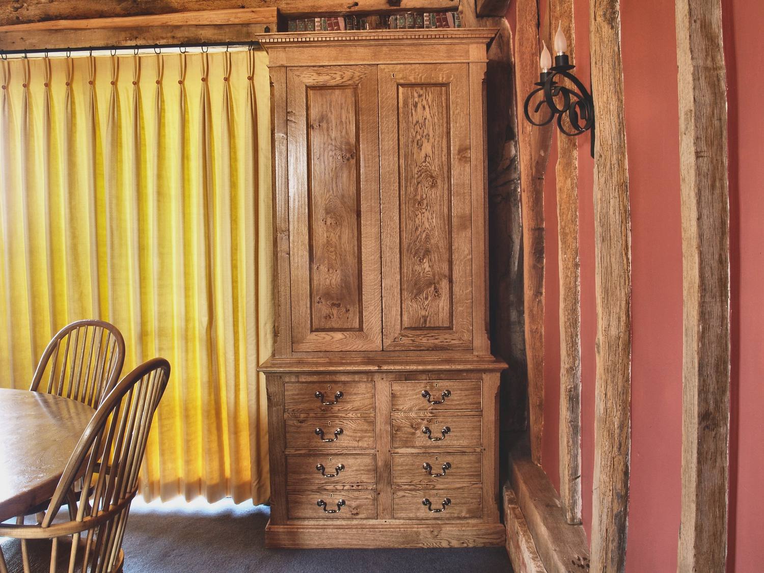 Sporting rooms treated as one scheme: cabinetry in a room setting, made in solid timber