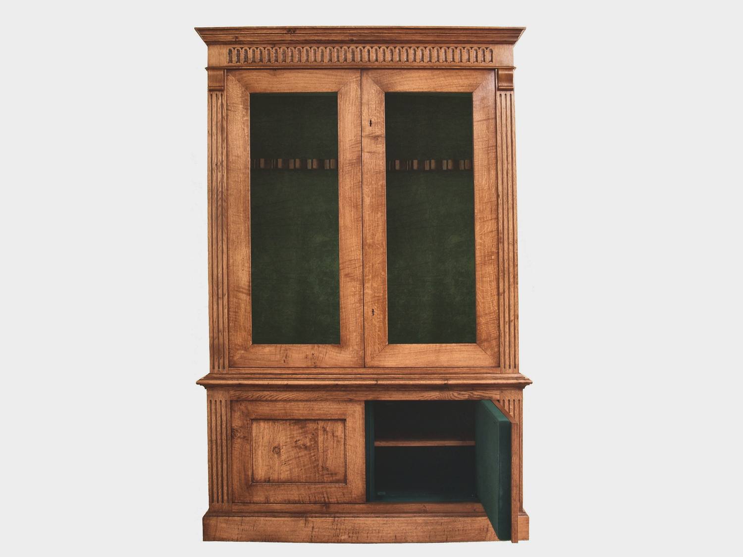 Gun cabinet interior with baize lining and separate ammunition storage
