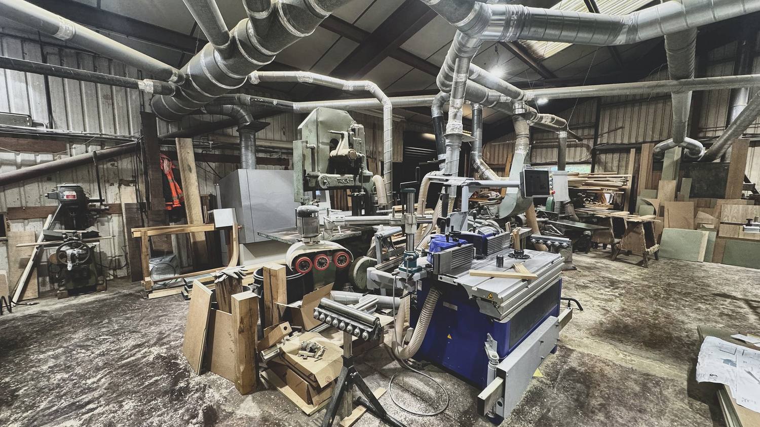 Machine shop with extraction ducting running to every machine