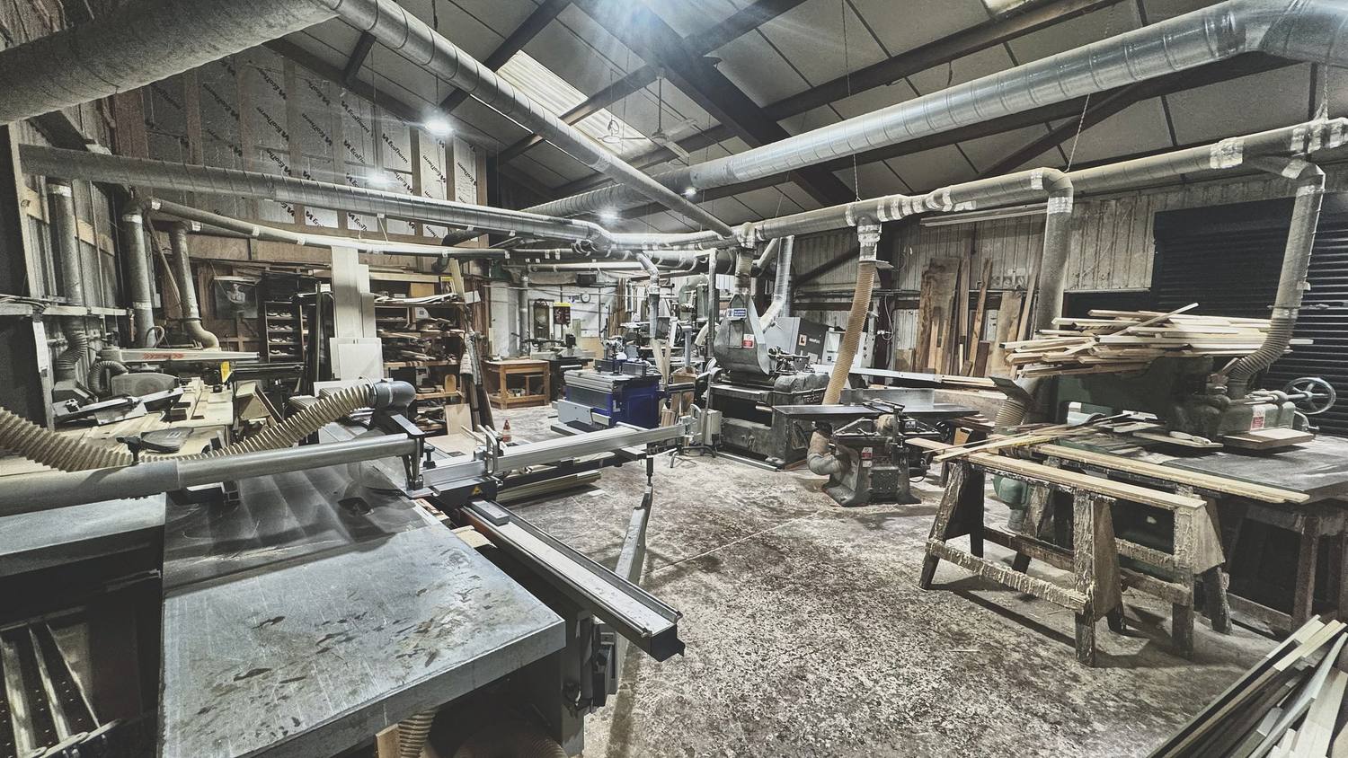 The machine shop at Mickfield with panel saw, moulder and planer