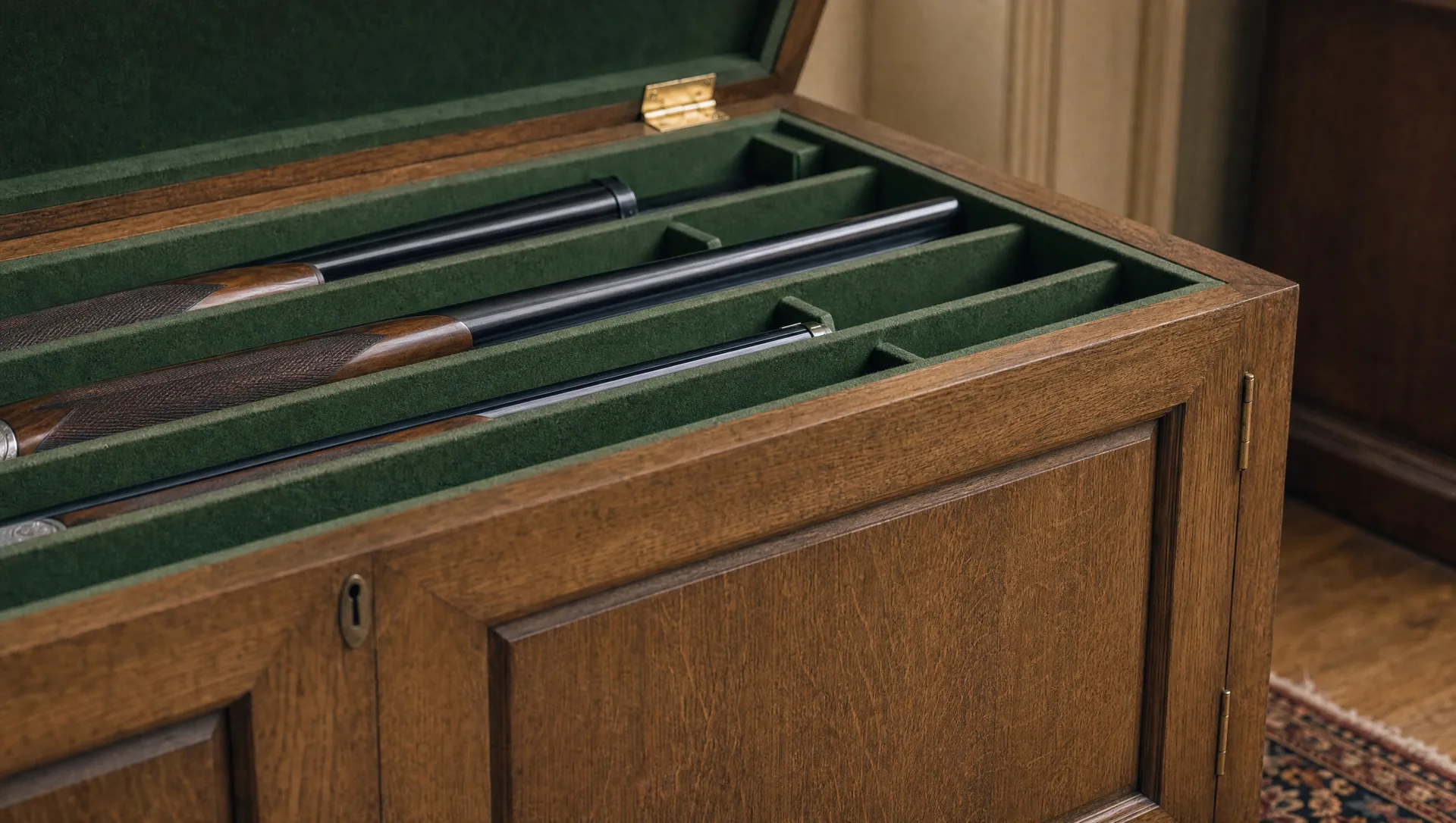 Close detail of baize-lined compartments cut to hold gun cases